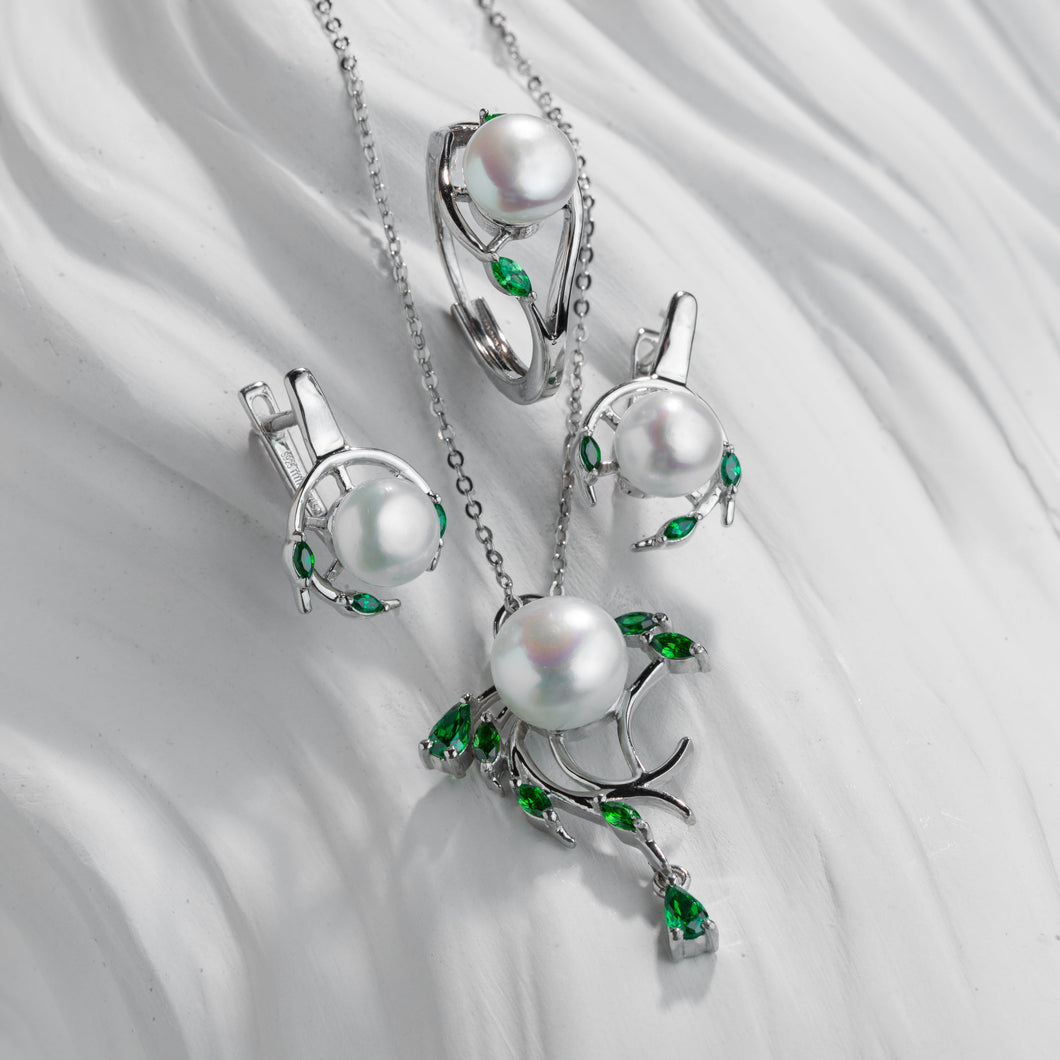 Yaşıl kristallarla bəzədilmiş qara mirvari dəst, klon, sırğalar və üzük