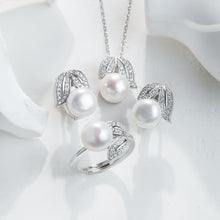 Qalereya görüntüsünə şəkil yükləyin, Pearl jewelry set with necklace, ring, and earrings on a white background
