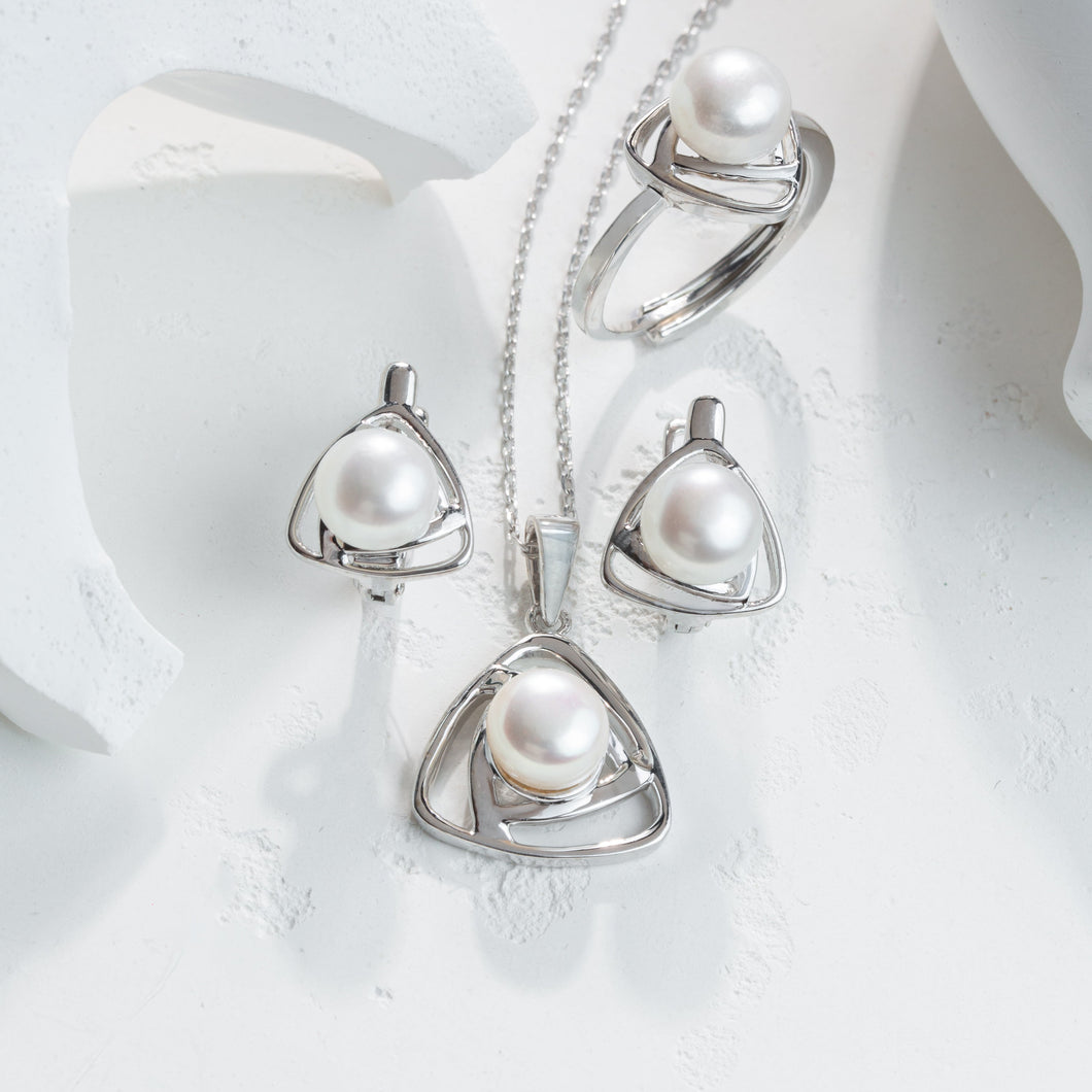 Pearl jewelry set with necklace, ring, and pendants on a white background