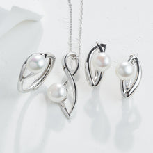 Qalereya görüntüsünə şəkil yükləyin, Silver jewelry set with pearls on a white background
