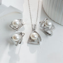 Qalereya görüntüsünə şəkil yükləyin, Pearl jewelry set with necklace, earrings, and ring on a white background
