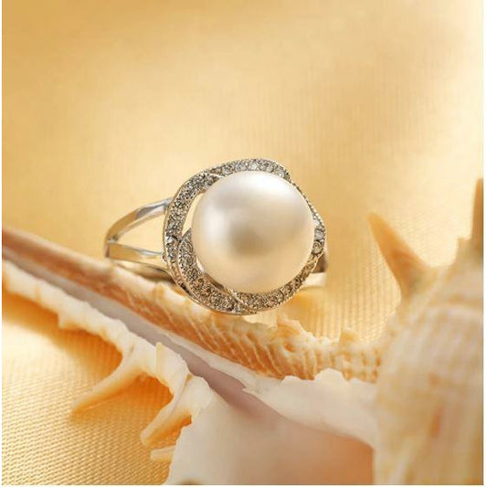 Zirkon qaşlarla bəzədilmiş mirvari üzük, ölçüsüz